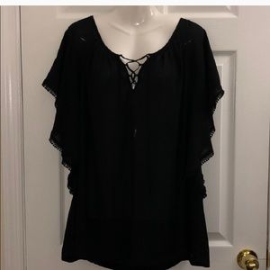 Beautiful sheer black blouse.